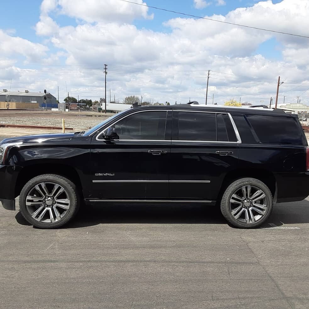 Black SUV tinted Tint plus auto glass in Hanford