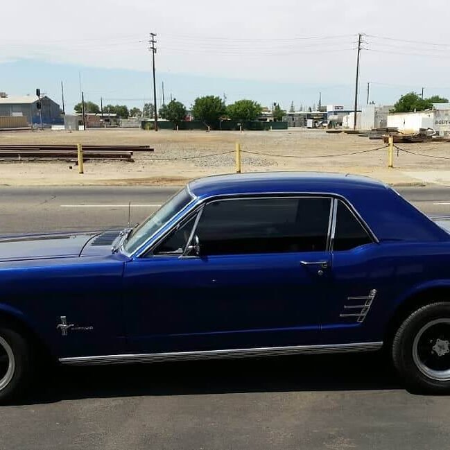 Dark blue Camaro tinted at tint plus auto glass in Hanford California